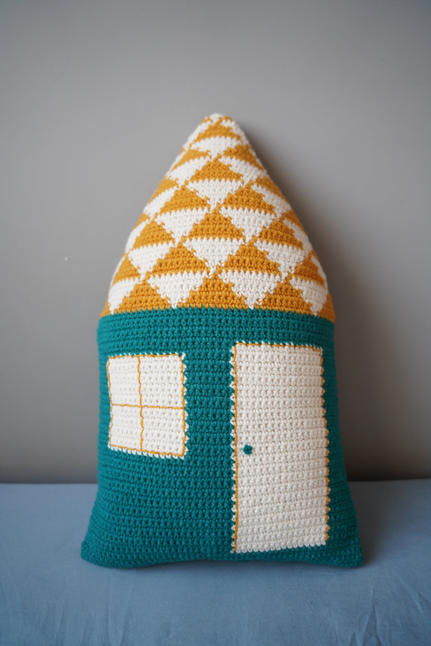 Yellow-Roofed Blue Cottage Crochet Pillow