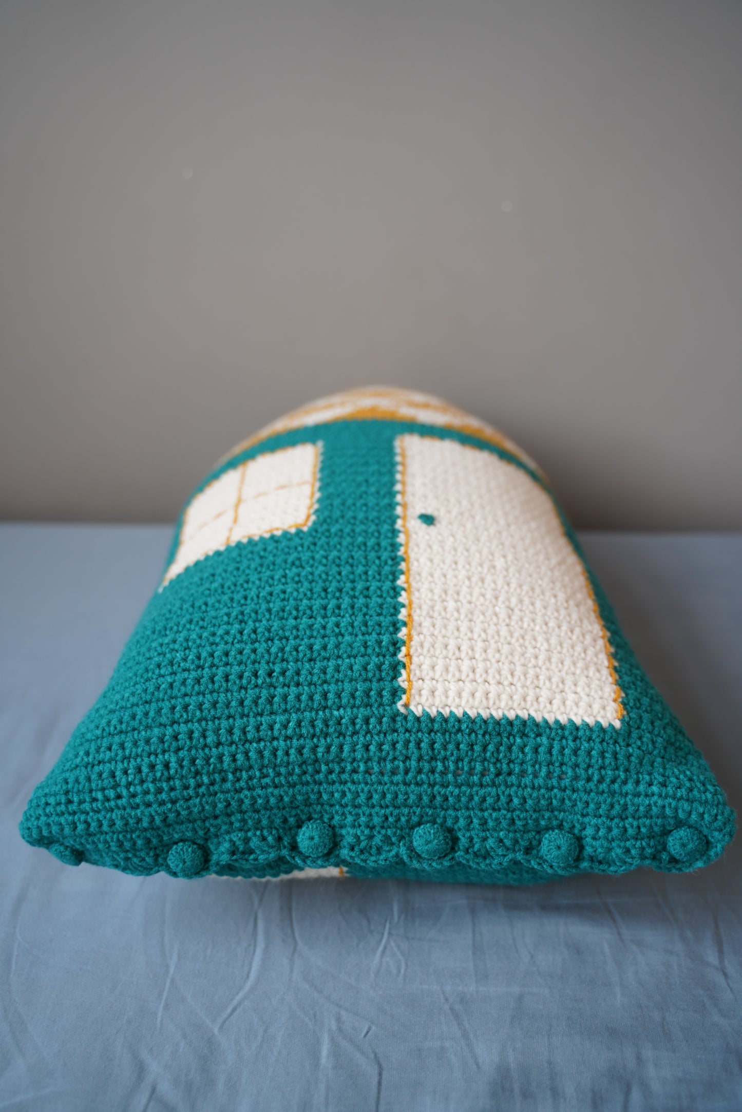 Yellow-Roofed Blue Cottage Crochet Pillow